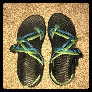 Blue and green patterned Chacos 🦎